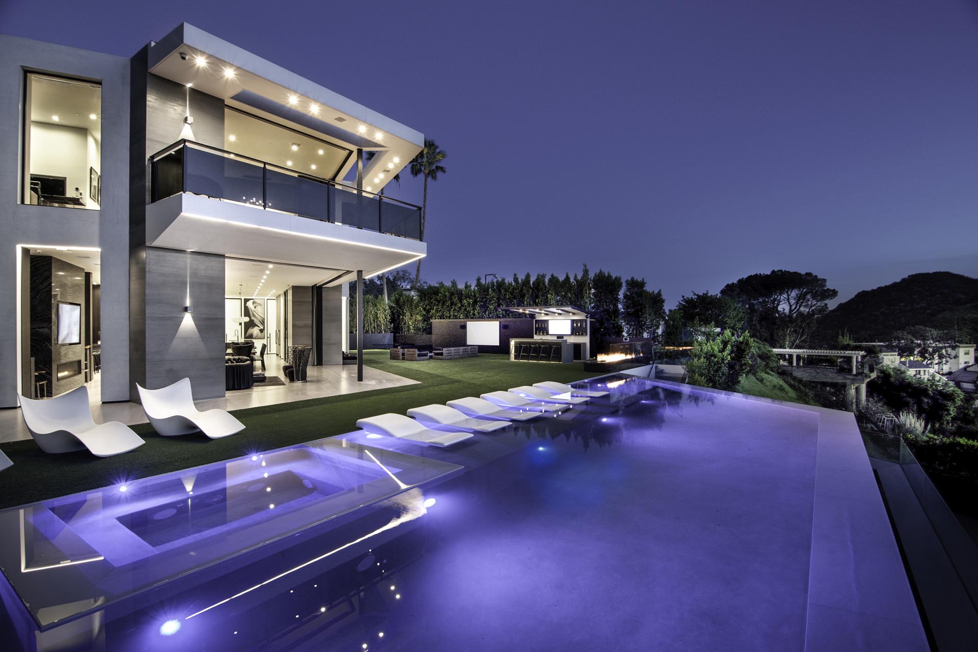 Infinity pool overlooking the city at dusk